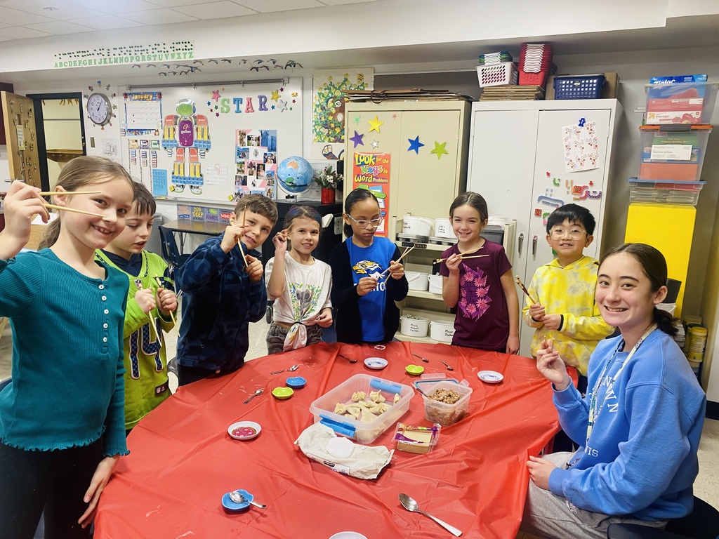 third graders making dumplings